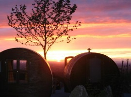 barrels used as rooms, the sunset on the background (Sesbachwalden)