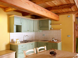 A chalet's kitchen of Ecovillage Sagna Rotonda, Piedmont