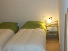 Bedroom in Ca' del Campanaro, bio agritourism in Villa D'Aiano, Castel D'Aiano