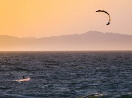 Kitesurfing, photo by Tim Martin via Unsplash