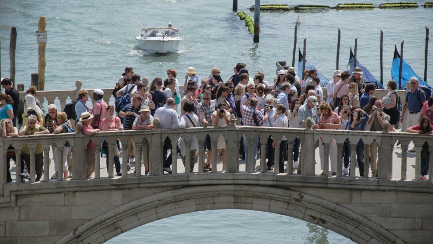Tourists crowd into Venice's bridges