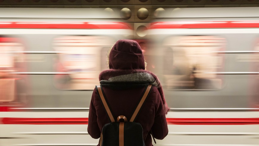 train passing in front of a person