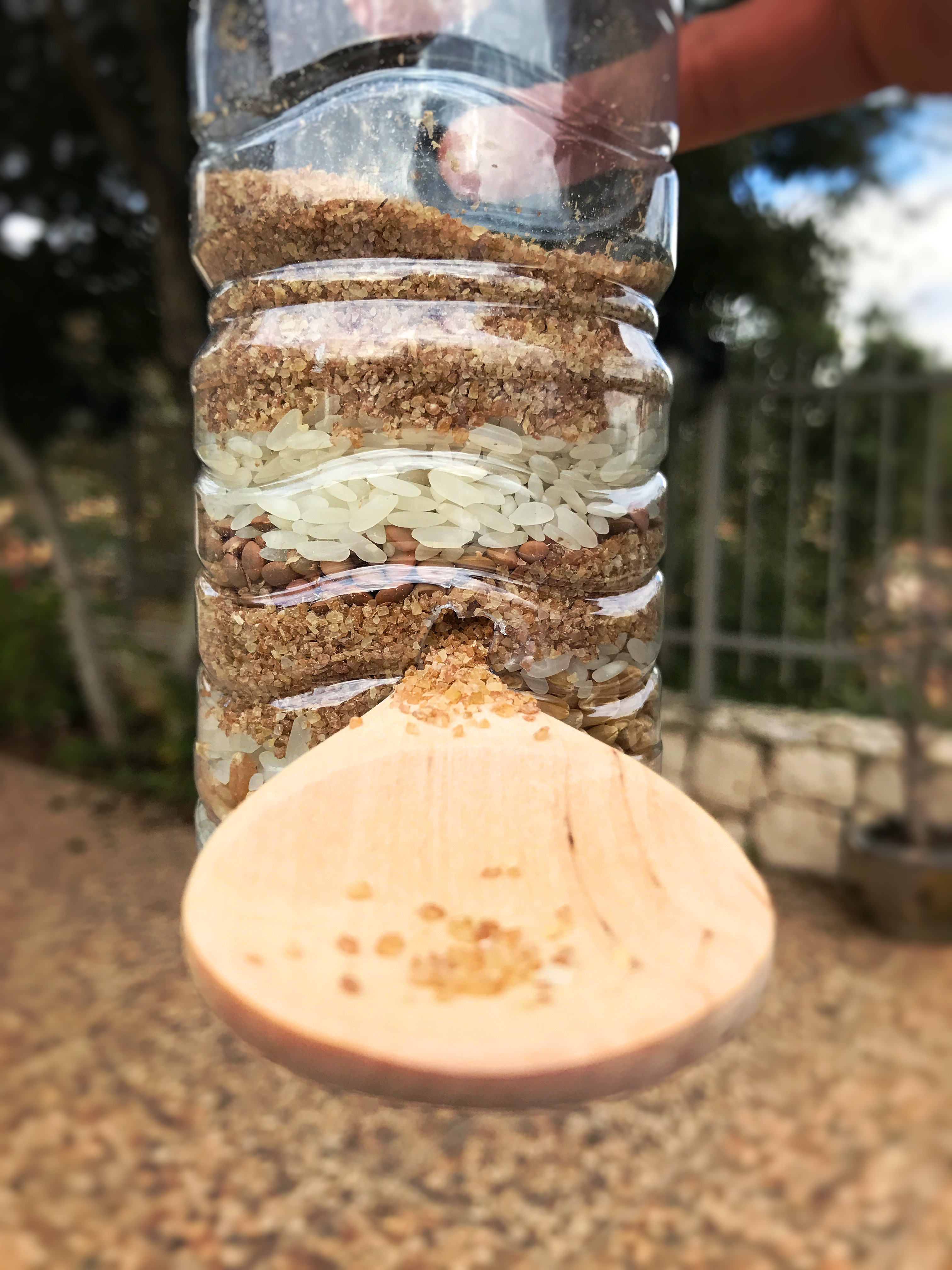 the Upcycled Birdfeeder with a close-up on the spoon