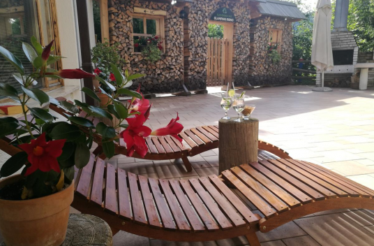 outdoor relax area at hotel and glamping Ribno