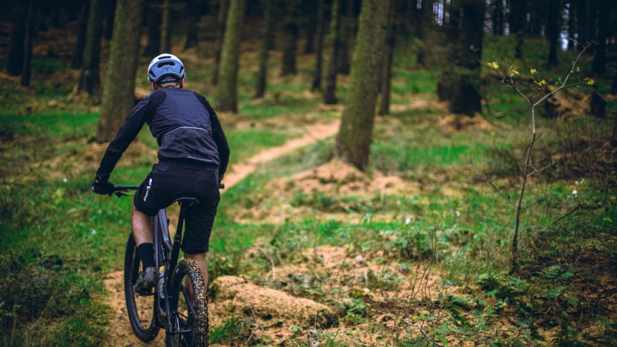 mountain biking in the woods