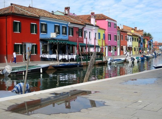 colourful houses of Burano and a small canal under them