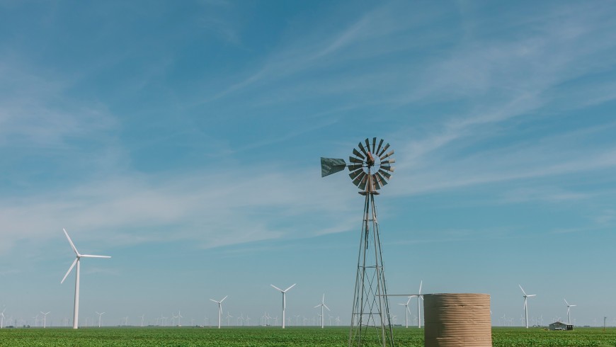 A windmill and wind turbines in West Texas.