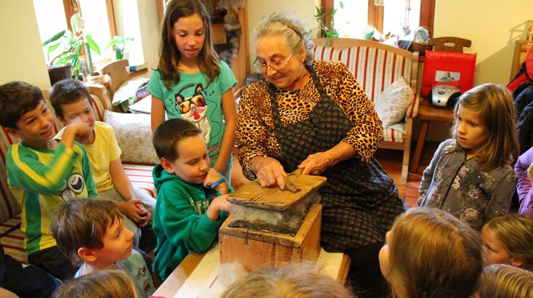 On the photo: the unconditional love of a granny while playing with the kids. 