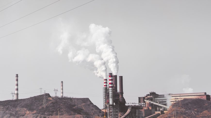 smoke coming out of industrial chimney