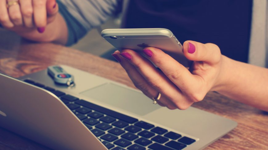 woman holding an iphone