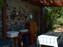 Outdoor kitchen at straw bale house felcerossa