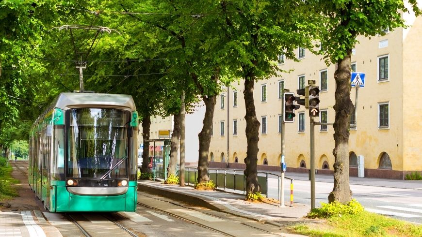 modern green tram in Helsinki, Finland