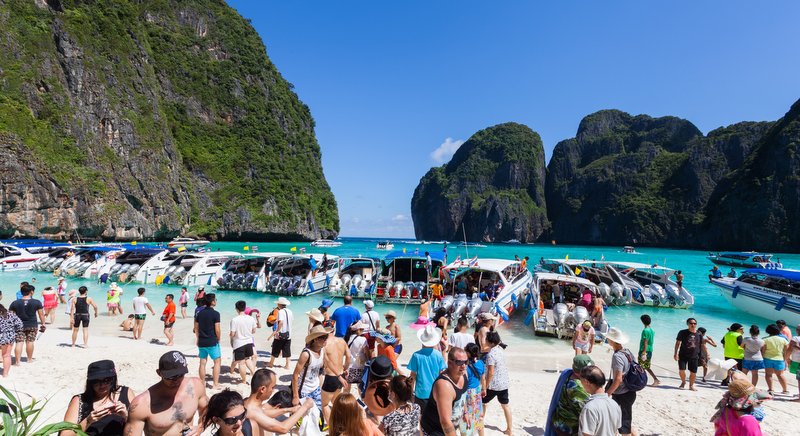 overcrowded beach, the phenomenon of overtourism