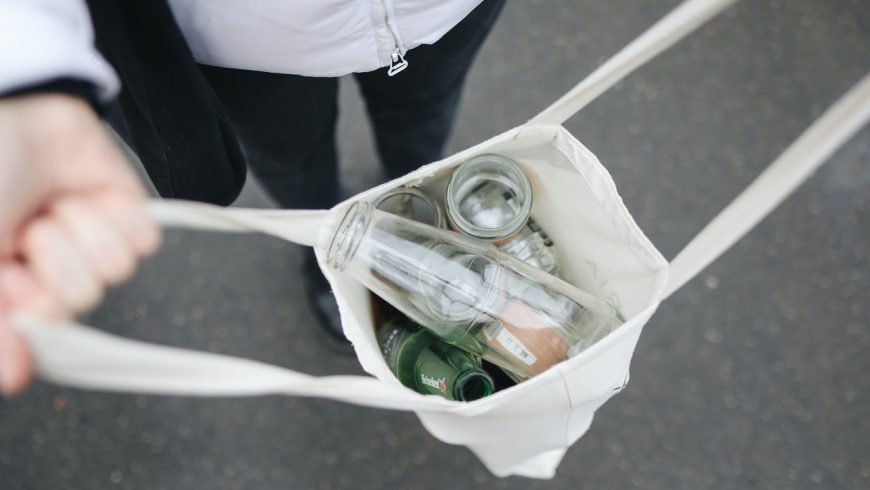 glass bottles in a tote bag