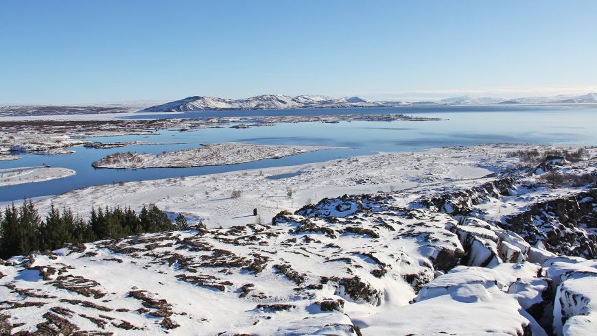 lake Þingvallavatn in the snow-covered landscape of the Þingvellir National Park, a stunning eco-tourist site