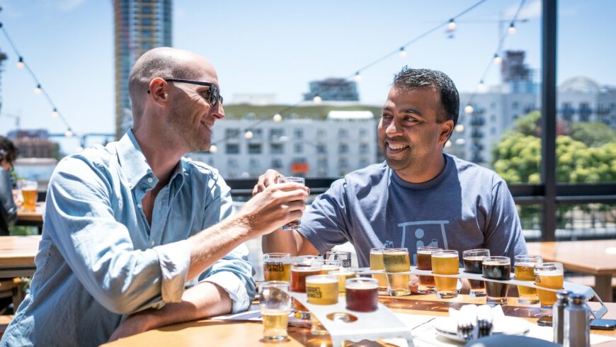 Two people drinking beer.