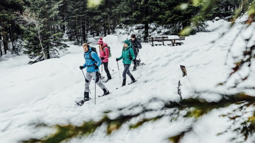 Snowshoeing in the woods in San Martino di Castrozza: one of the many activities offered by the More Than Just Skiing event