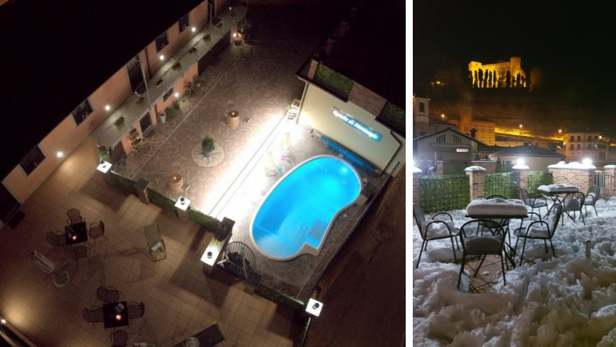 Rocche di Montexelo at night: view of the outdoor pool from above, and view of the castle under the snow.