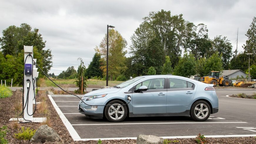 plugged electric car getting charged