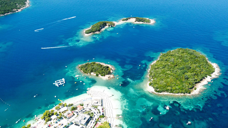 Aerial view of Tongo Island in Ksamil, one of the most beautiful beaches in Southern Albania
