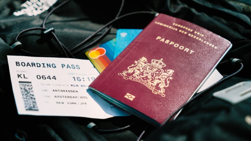 Passport and boarding pass on a luggage