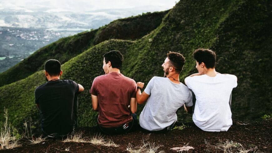four friends on a mountain