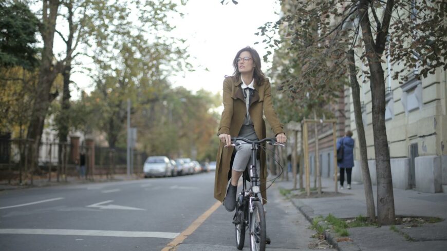 A woman cycling in a city