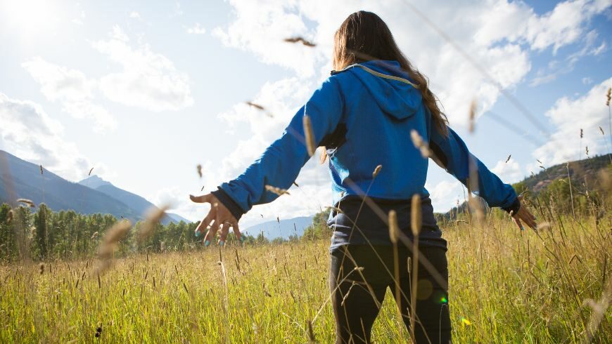 indigenous canadian walking in the field