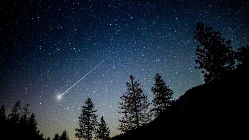 Night view of a starry sky over a natural landscape