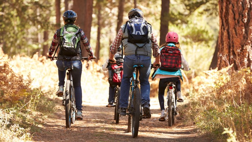 family exploring a path in ebike