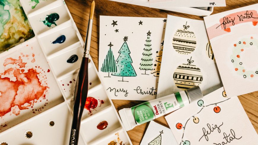 Handmade holiday cards with handwritten messages and personal signature