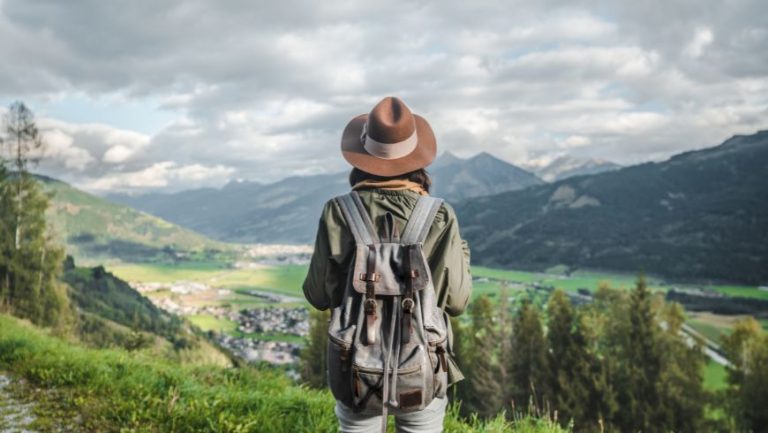 Girl travelling respecting nature, with the priciples of ethical tourism