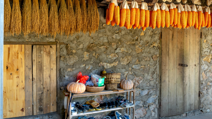 Stone Barn with Drying Corn and Straw