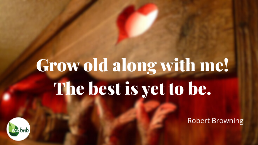 Romantic quote by Robert Browning in elegant white typography over a warm, softly blurred background with natural elements and a red heart, featuring the Eco BnB logo.