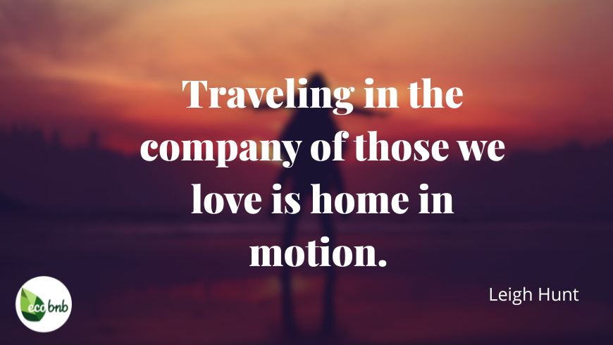 Travel quote about love in elegant typography over an image of a couple together in motion, set in a warm and evocative atmosphere that conveys the feeling of home while traveling.