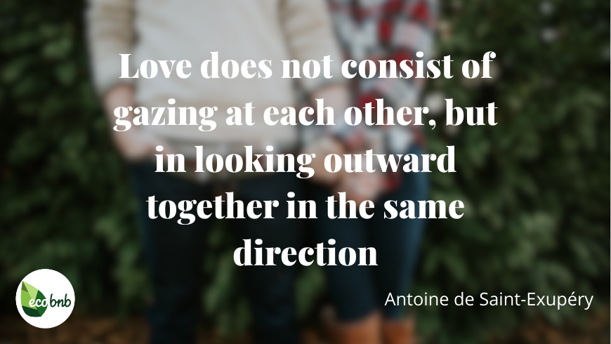 Poetic love quote by Antoine de Saint-Exupéry in elegant white typography over a warm, softly blurred natural background with autumn tones, featuring the Eco BnB logo.