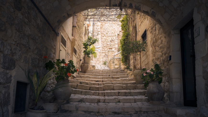 stairs under an arch 