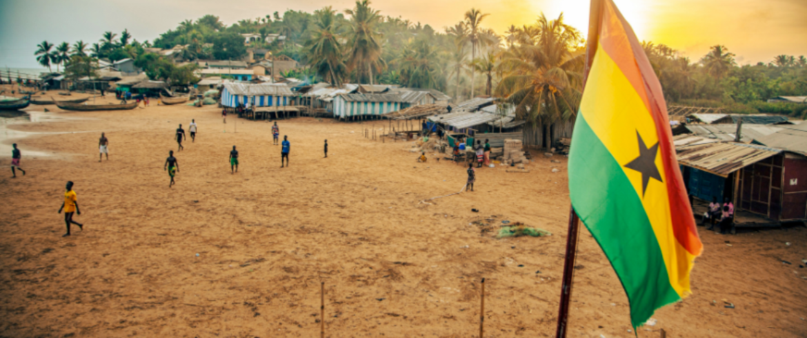 ghana village landscape with ghana flag slow travel ghana