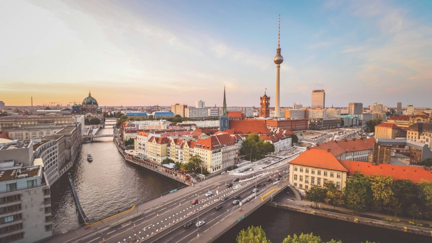 Sustainableb Berlin travel: panoramic Tower and Spree River at sunset.
