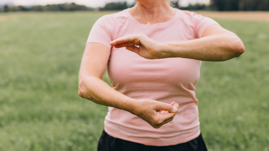 Woman doing a special movement in a park