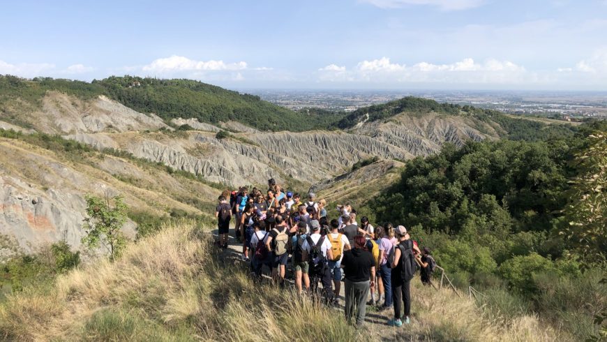 People walking along the Emilian hills among nature