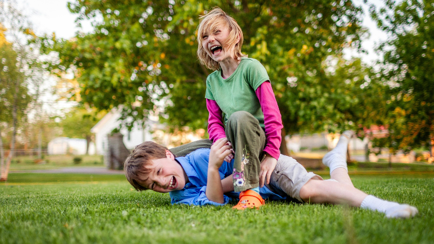 Children playing together in a park