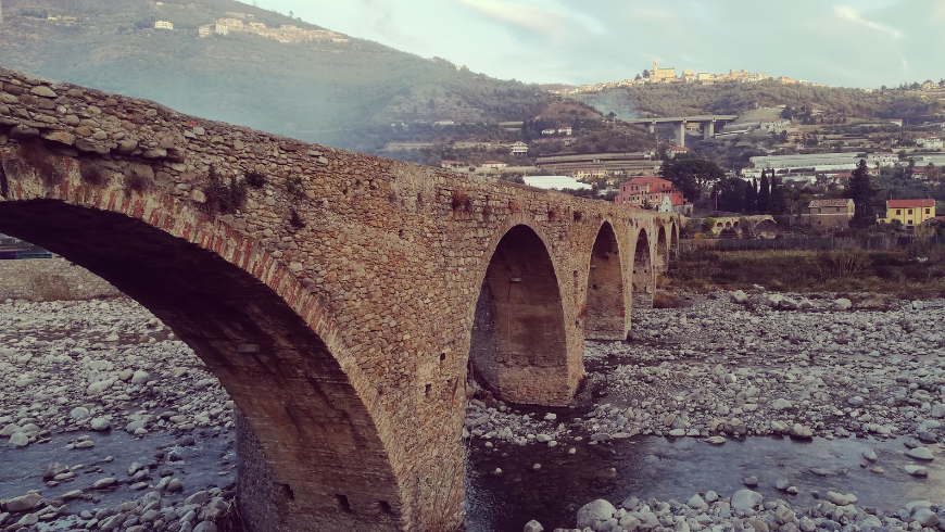 Ancient stone and brick bridge in Taggia