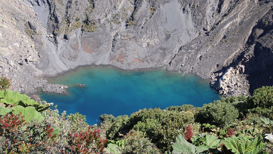 Close-up of volcanic rocks, crater lake and vegetation at Irazú Volcano in Cartago Province, Costa Rica.