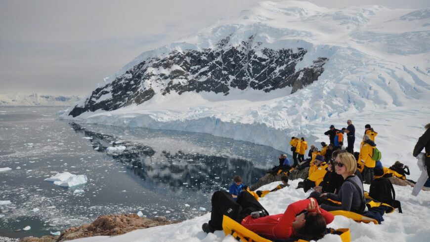 People sitting on an iceberg