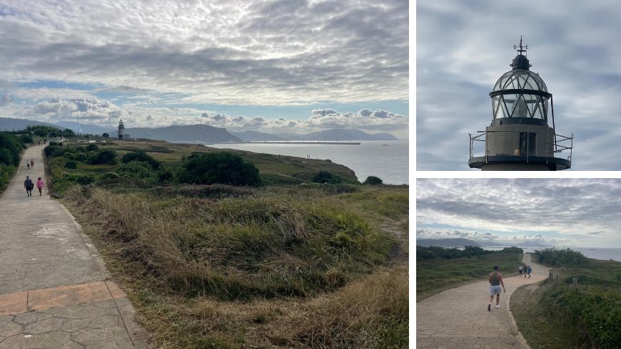 Sendero costero hacia Getxo, con un faro y personas caminando por la costa vasca.